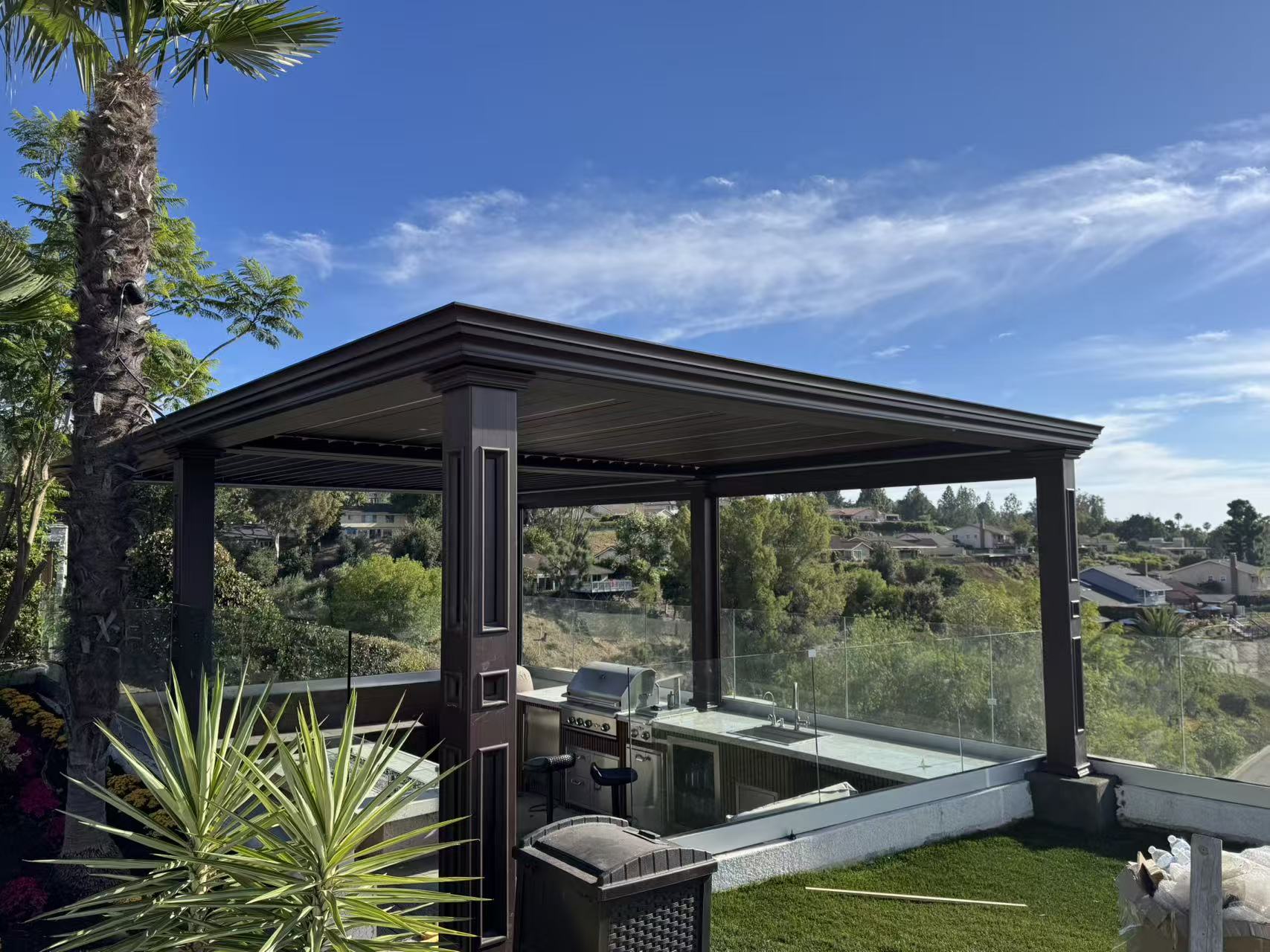 Completed bronze aluminum louvered pergola over the hilltop outdoor kitchen in Anaheim