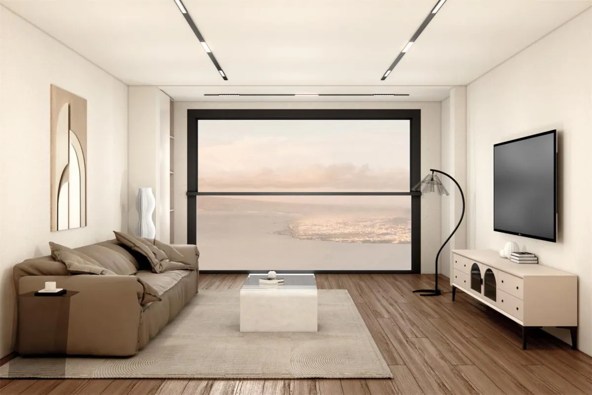Luxora large-format black-frame glass wall in a warm neutral living room